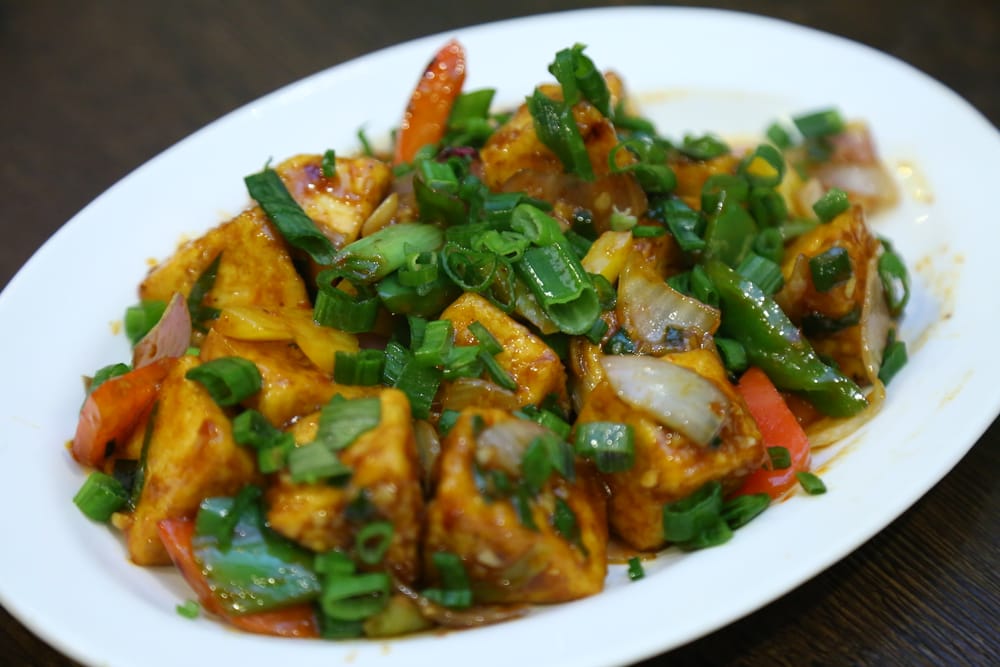 Chilli paneer with peppers and onion