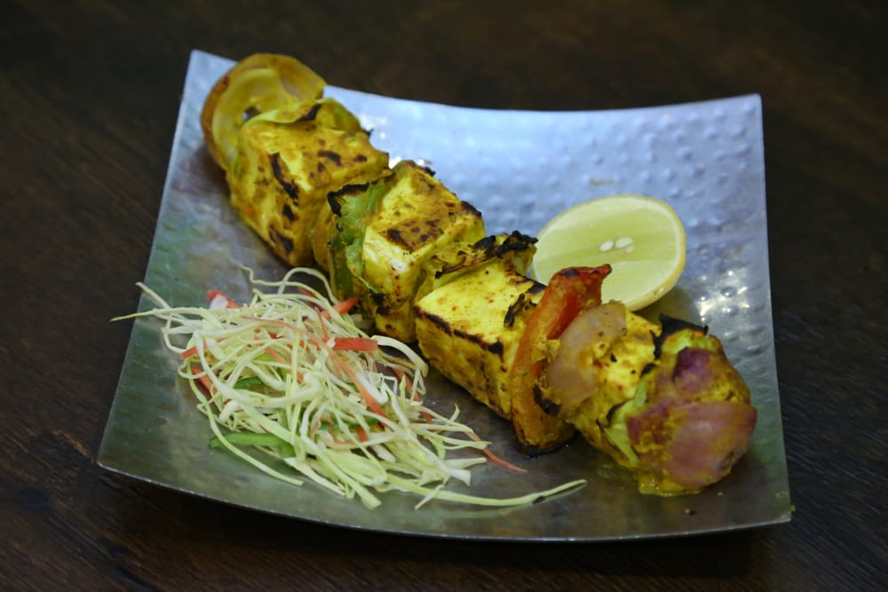 Paneer tikka skewer with capsicum and onion